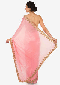 Peach georgette saree with unstitched blouse adorn in heavy cut dana work only on Kalki