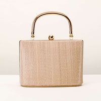 Peach Gold Clutch In Crush Fabric With Metal Handle And Clasp Closure