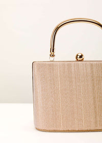 Peach Gold Clutch In Crush Fabric With Metal Handle And Clasp Closure