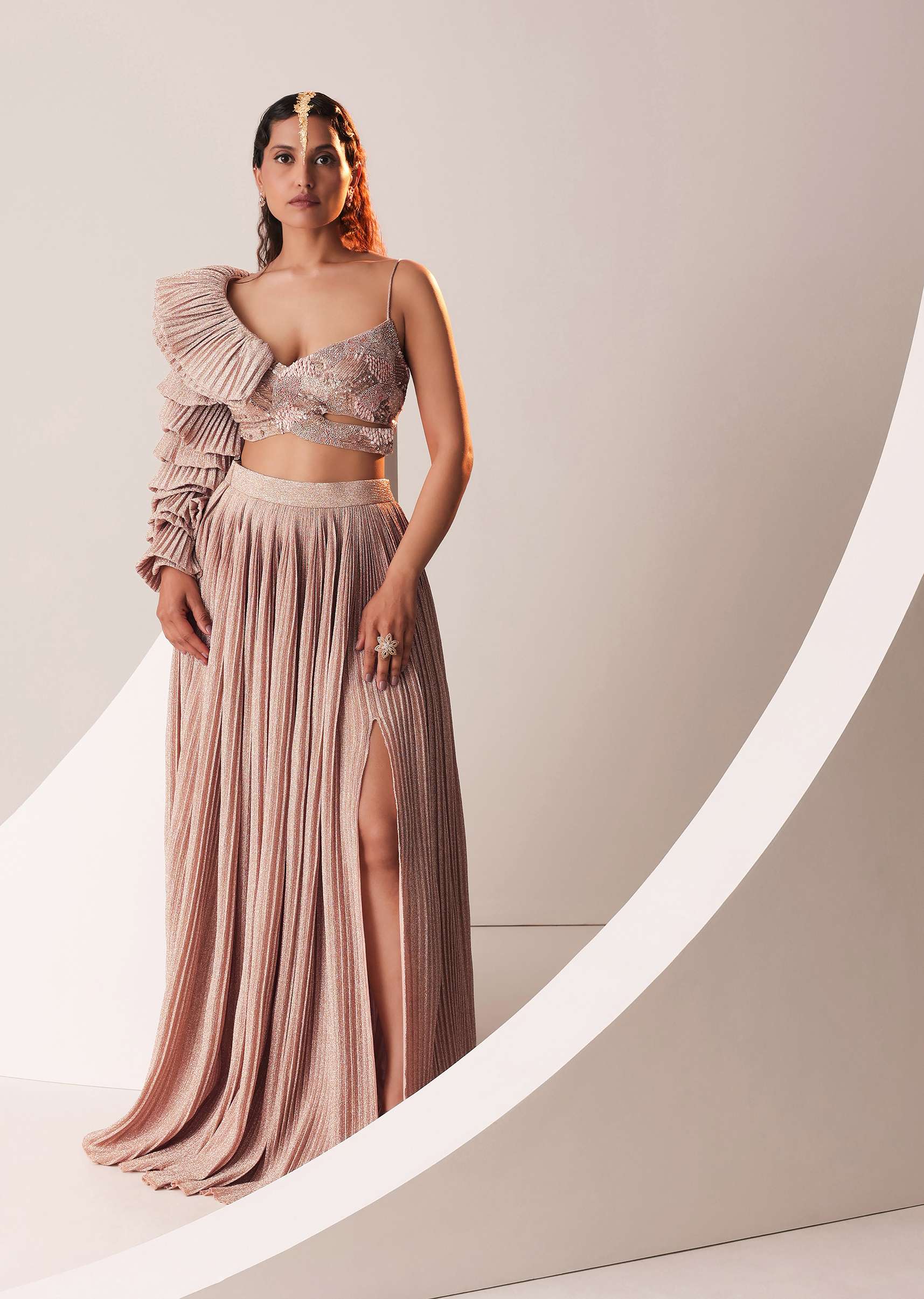 Peach Gold Embroidered Skirt And Top Set In Knit Strechable Fabric