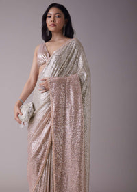 Peach Pink And Silver Toned Sequins Saree With An Embellished Border