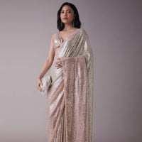 Peach Pink And Silver Toned Sequins Saree With An Embellished Border