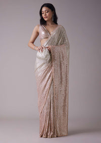 Peach Pink And Silver Toned Sequins Saree With An Embellished Border