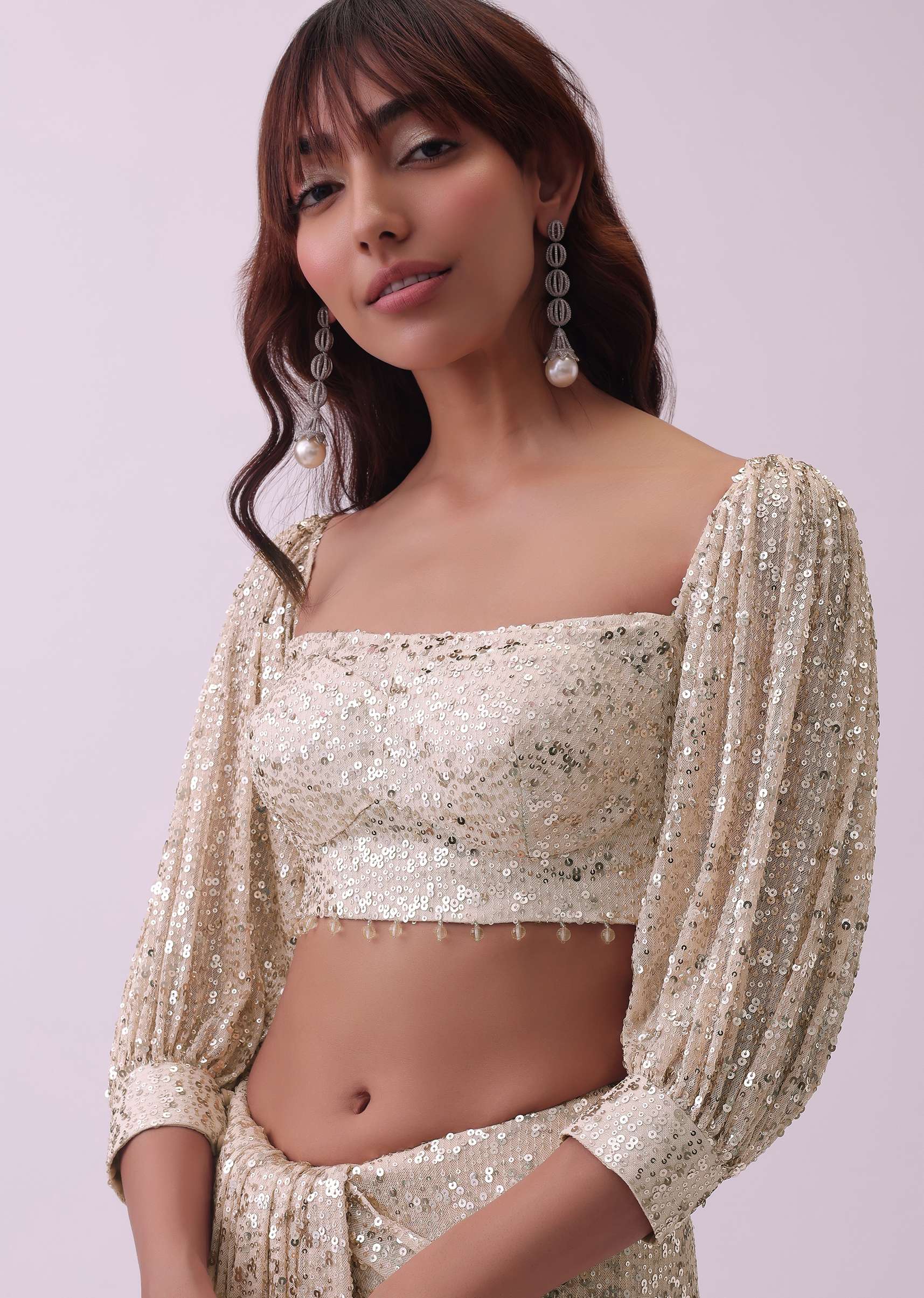 Peach Saree And Stitched Blouse With Hanging Crystals