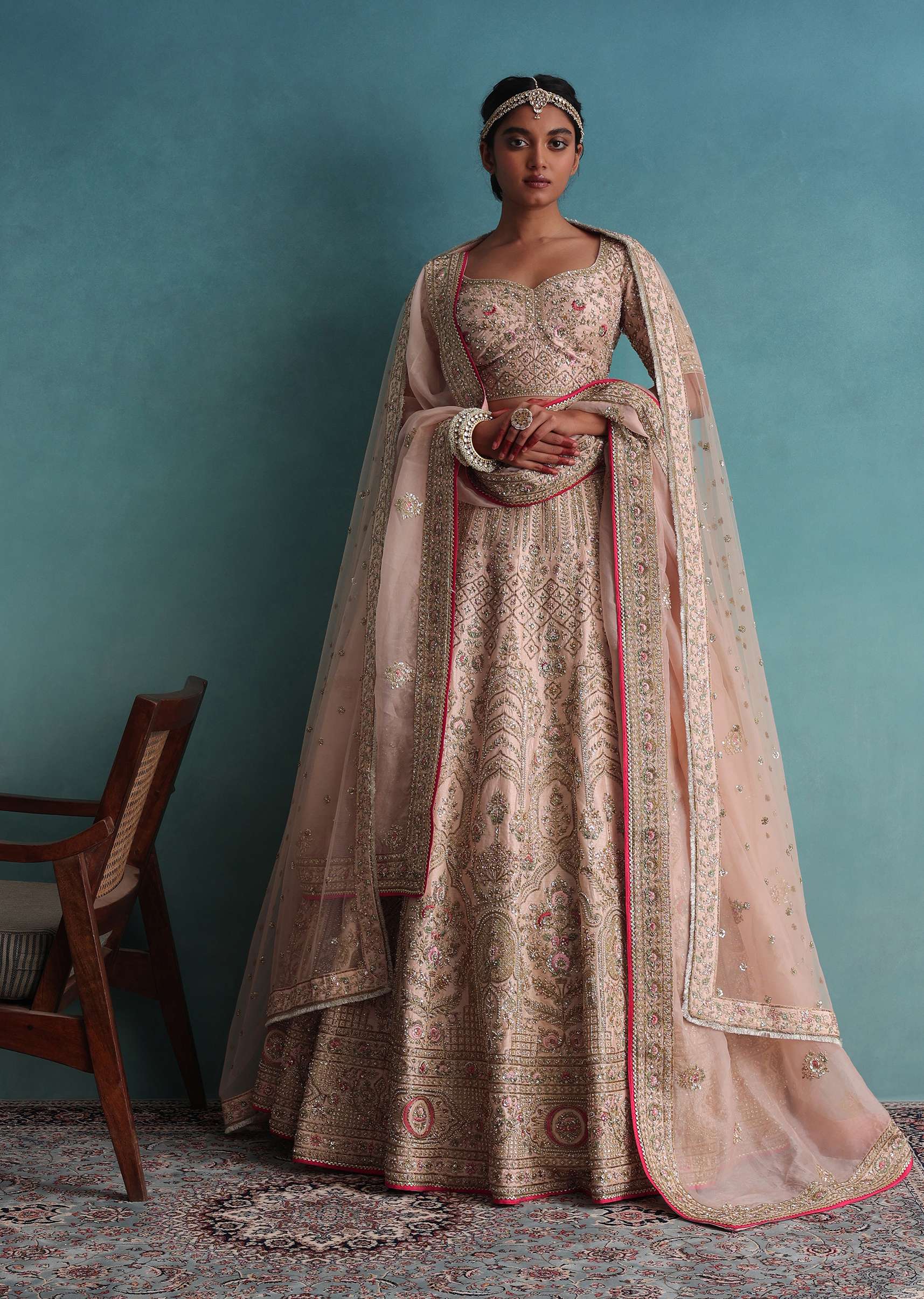 Peach Pink Embroidered 12 Kali Bridal Lehenga With Embroidered Belt In Raw Silk