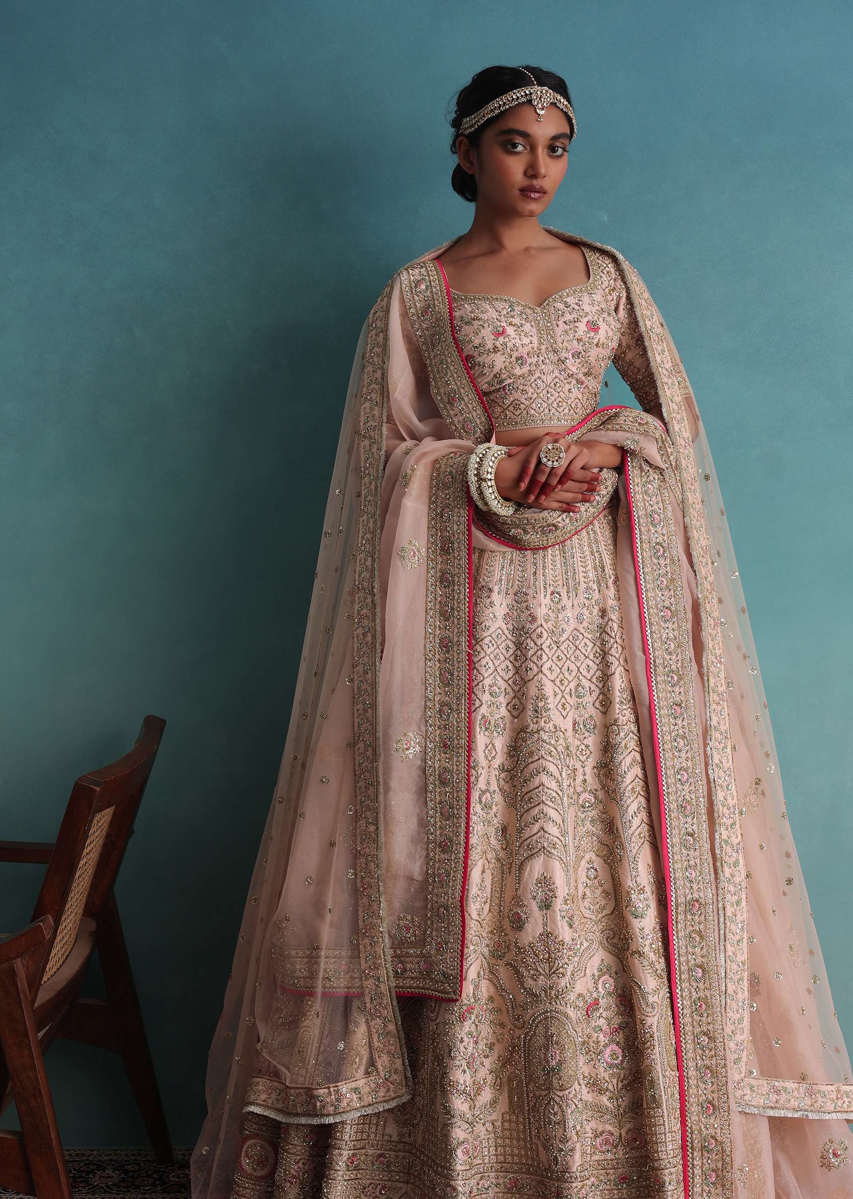 Peach Pink Embroidered 12 Kali Bridal Lehenga With Embroidered Belt In Raw Silk