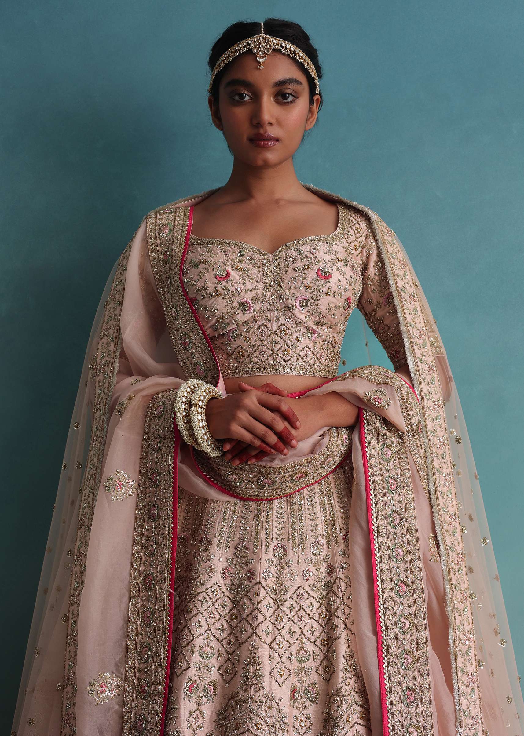 Peach Pink Embroidered 12 Kali Bridal Lehenga With Embroidered Belt In Raw Silk