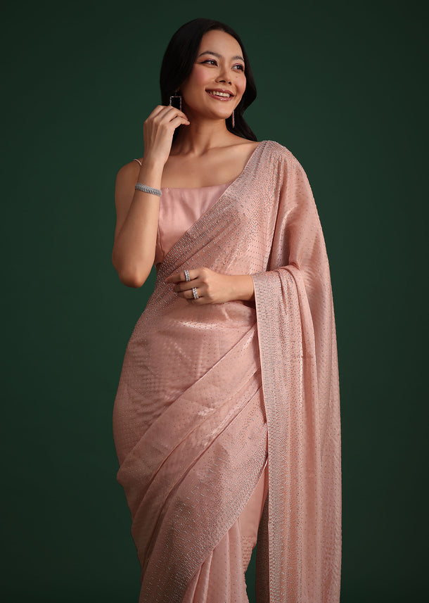 Peach Satin Heavy Embroidered Saree With Stones And Diamonds All Over