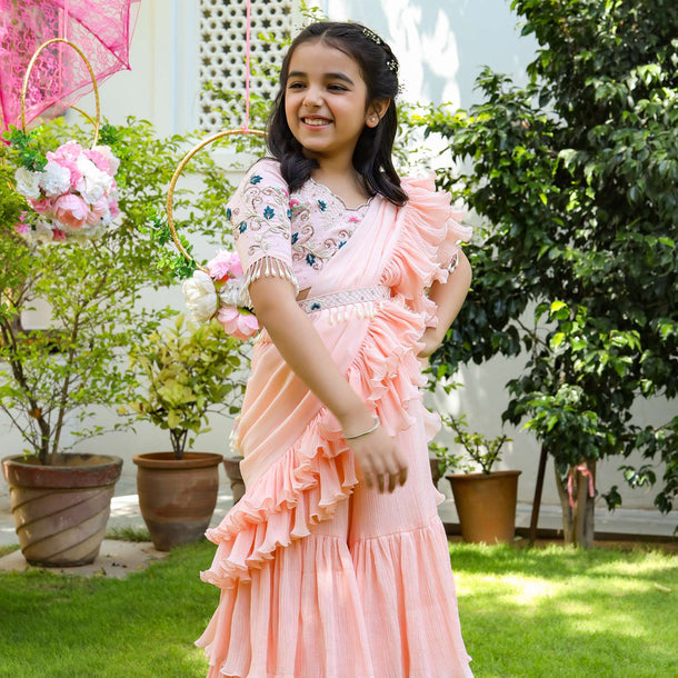 Kalki Girls Peach Sharara Saree With Floral Embellished Blouse And Ruffle Drape