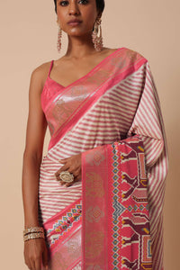 Peach Silk Patola Print Saree With Foil Worked Border And Unstitched Blouse Piece