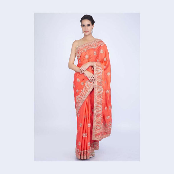 Peachish orange cotton silk saree in cord embroidered butti and border only on Kalki