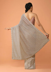 Peachy Beige Half And Half Saree In Crepe With Sequins Embellished Floral Motifs And Sequins Lycra Pallu Online - Kalki Fashion