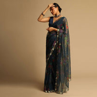 Peacock Blue Saree In Organza With Floral Print All Over And Moti Embroidered Border Along With Unstitched Blouse