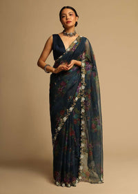 Peacock Blue Saree In Organza With Floral Print All Over And Moti Embroidered Border Along With Unstitched Blouse