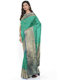 Peacock green banarasi silk saree with blue border only on Kalki