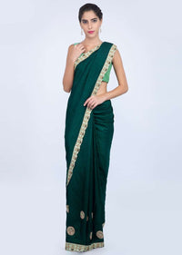 Peacock green dupion silk saree with embroidered butti and border only on kalki