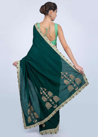 Peacock green dupion silk saree with embroidered butti and border only on kalki