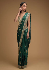 Bottle Green Saree In Satin With Hand Embroidered Floral Buttis Using Cut Dana And Sequins Work Along With Unstitched Blouse