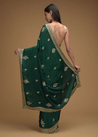 Bottle Green Saree In Satin With Hand Embroidered Floral Buttis Using Cut Dana And Sequins Work Along With Unstitched Blouse