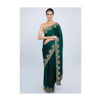 Peacock green satin saree with cut dana floral embroidered border only on Kalki