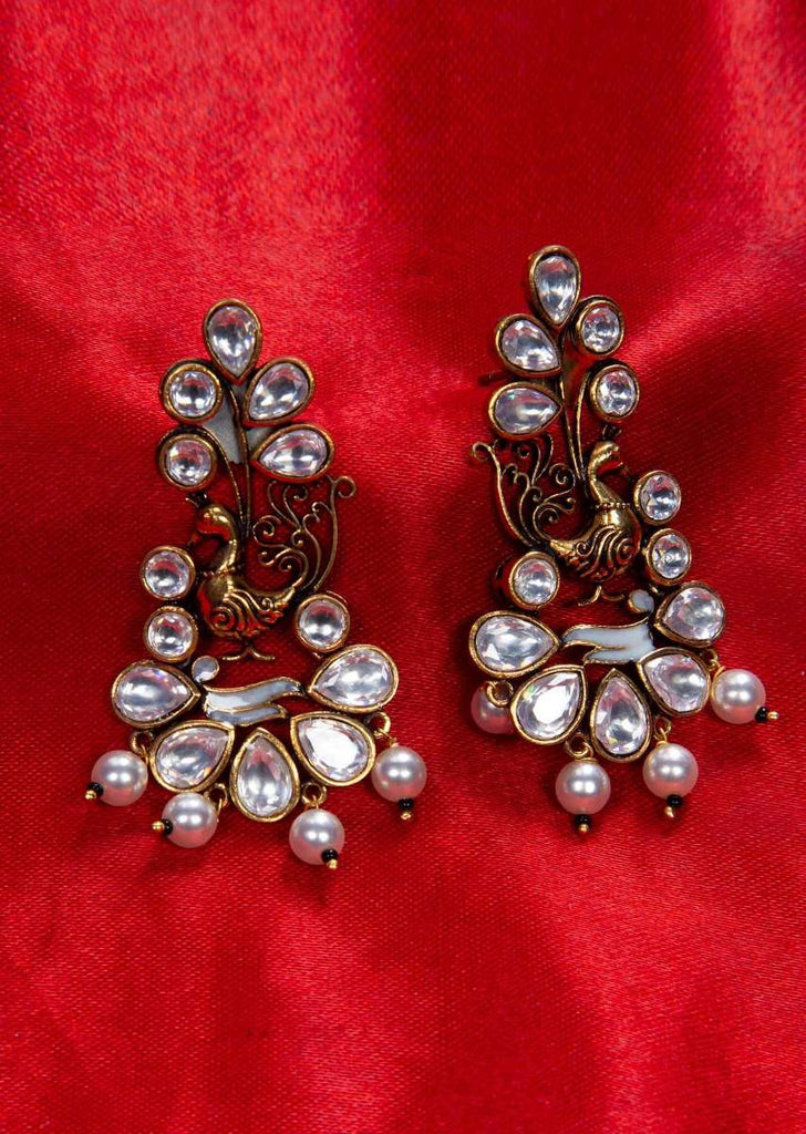 Peacock motif kundan studded earring with cut work  only on kalki