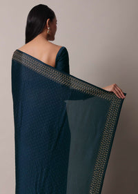 Peacock Blue Saree In Satin With Embellishments And Unstitched Blouse Piece
