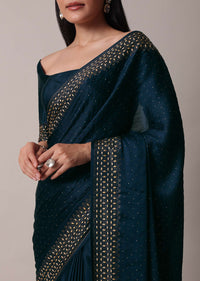 Peacock Blue Saree In Satin With Embellishments And Unstitched Blouse Piece