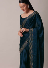 Peacock Blue Saree In Satin With Embellishments And Unstitched Blouse Piece