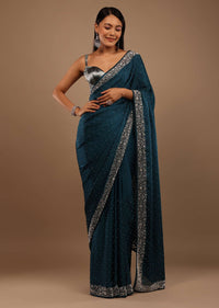 Peacock Blue Satin Saree With Stone Work On The Border