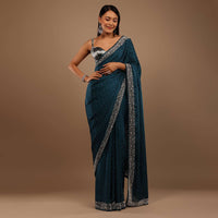 Peacock Blue Satin Saree With Stone Work On The Border