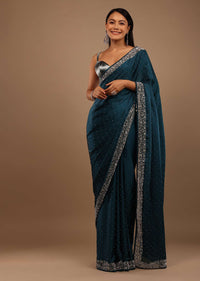 Peacock Blue Satin Saree With Stone Work On The Border