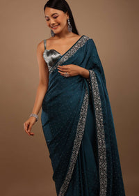 Peacock Blue Satin Saree With Stone Work On The Border