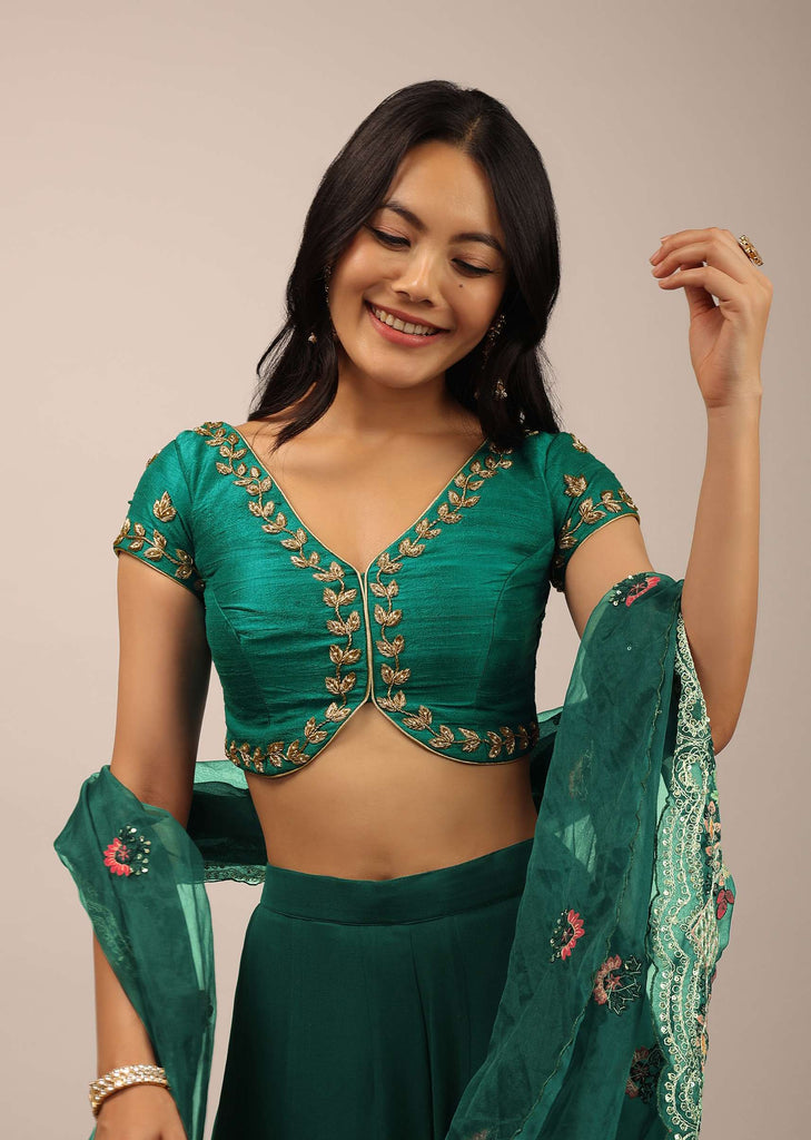 Peacock Green Blouse In Raw Silk With Zardosi Embroidery And A Diamond Cut Out On The Back