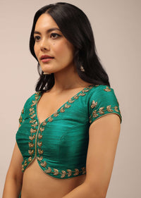 Peacock Green Blouse In Raw Silk With Zardosi Embroidery And A Diamond Cut Out On The Back