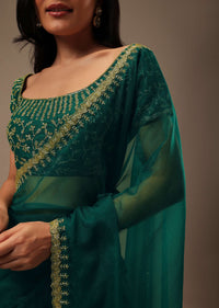 Peacock Green Plain Organza Saree With Heavy Cut Dana Work