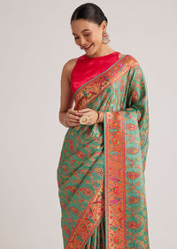 Peacock Green Satin Silk Saree With Jaal Work And Zari Border