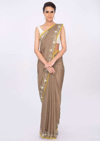 Peanut brown organza saree with floral embroidered border only on kalki