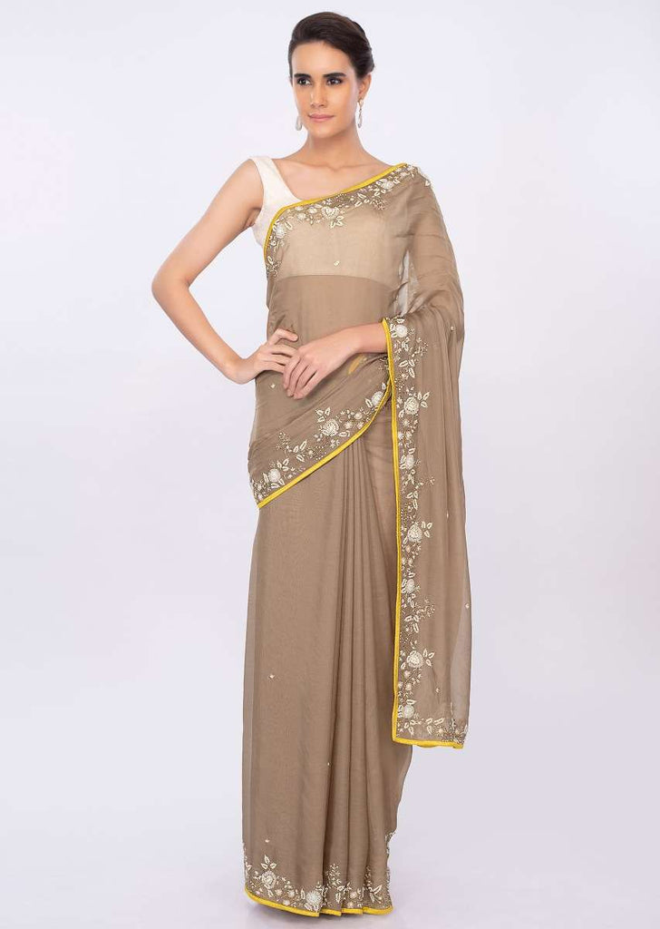 Peanut brown organza saree with floral embroidered border only on kalki