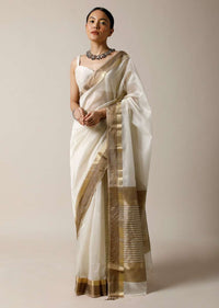 Pearl White Saree In Cotton Silk With Woven Golden Border And Contrasting Unstitched Blouse