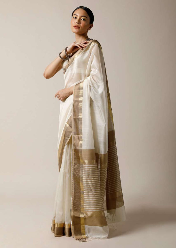 Pearl White Saree In Cotton Silk With Woven Golden Border And Contrasting Unstitched Blouse