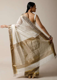 Pearl White Saree In Cotton Silk With Woven Golden Border And Contrasting Unstitched Blouse