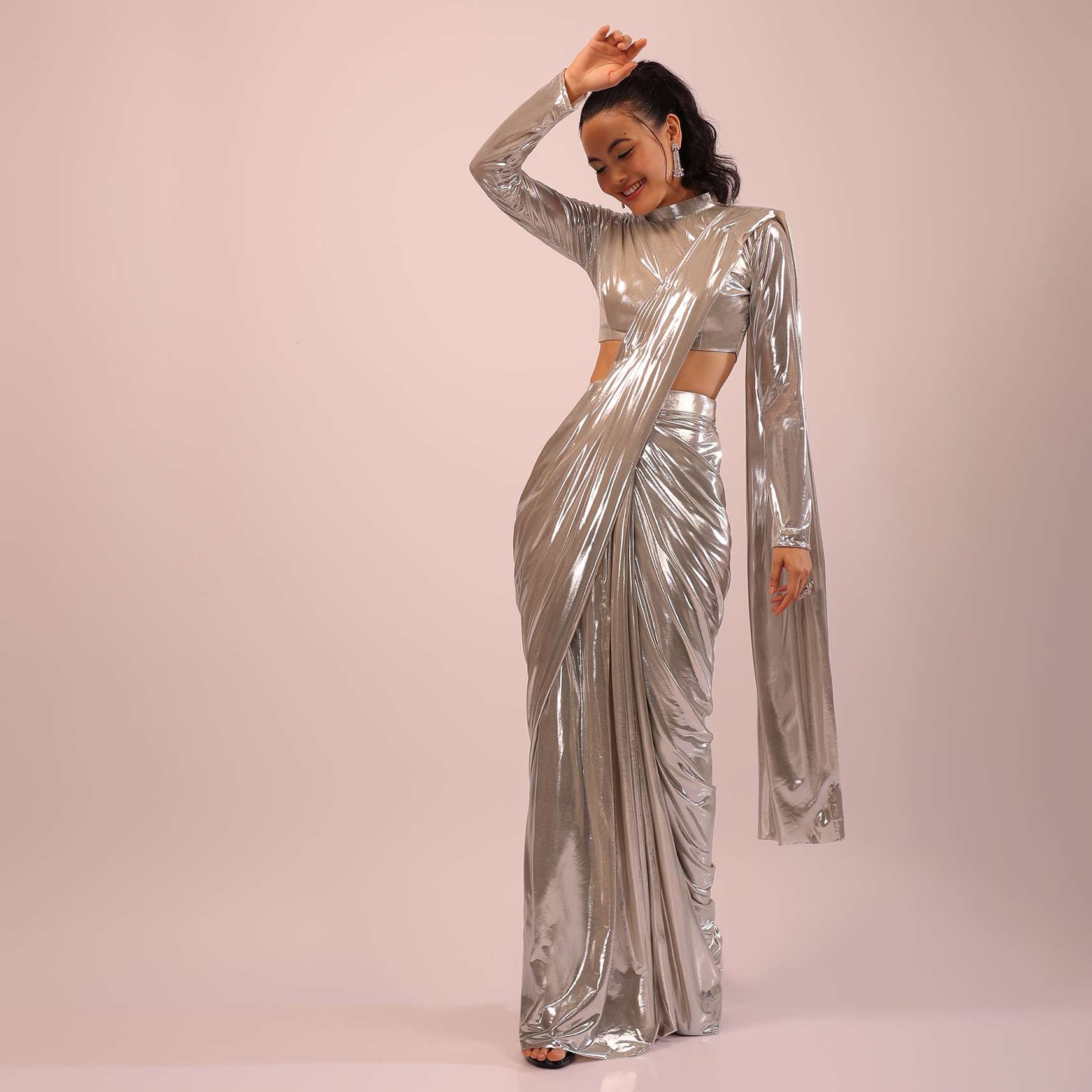 Pearl Ready Pleated Saree In Metallic Lycra With A High Neck Blouse Having Elegant Full Sleeves