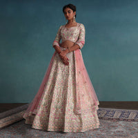 Pearl White Embroidered Bridal Lehenga In Raw Silk With Floral Hand Embroidery