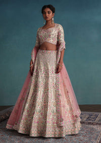 Pearl White Embroidered Bridal Lehenga In Raw Silk With Floral Hand Embroidery