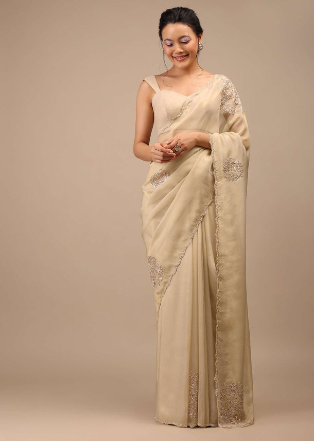 Pebble Brown Glass Tissue Saree Adorned With Floral Buttis, Zardosi Embroidery And 3D Sequins