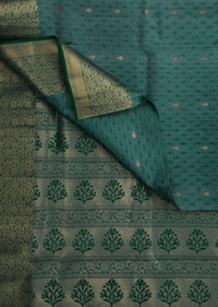 Peocock saree in silk beautified in weaved embroidery only on Kalki