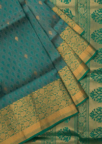 Peocock saree in silk beautified in weaved embroidery only on Kalki