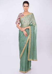 Persian green organza saree with pink floral embroidered blouse only on kalki