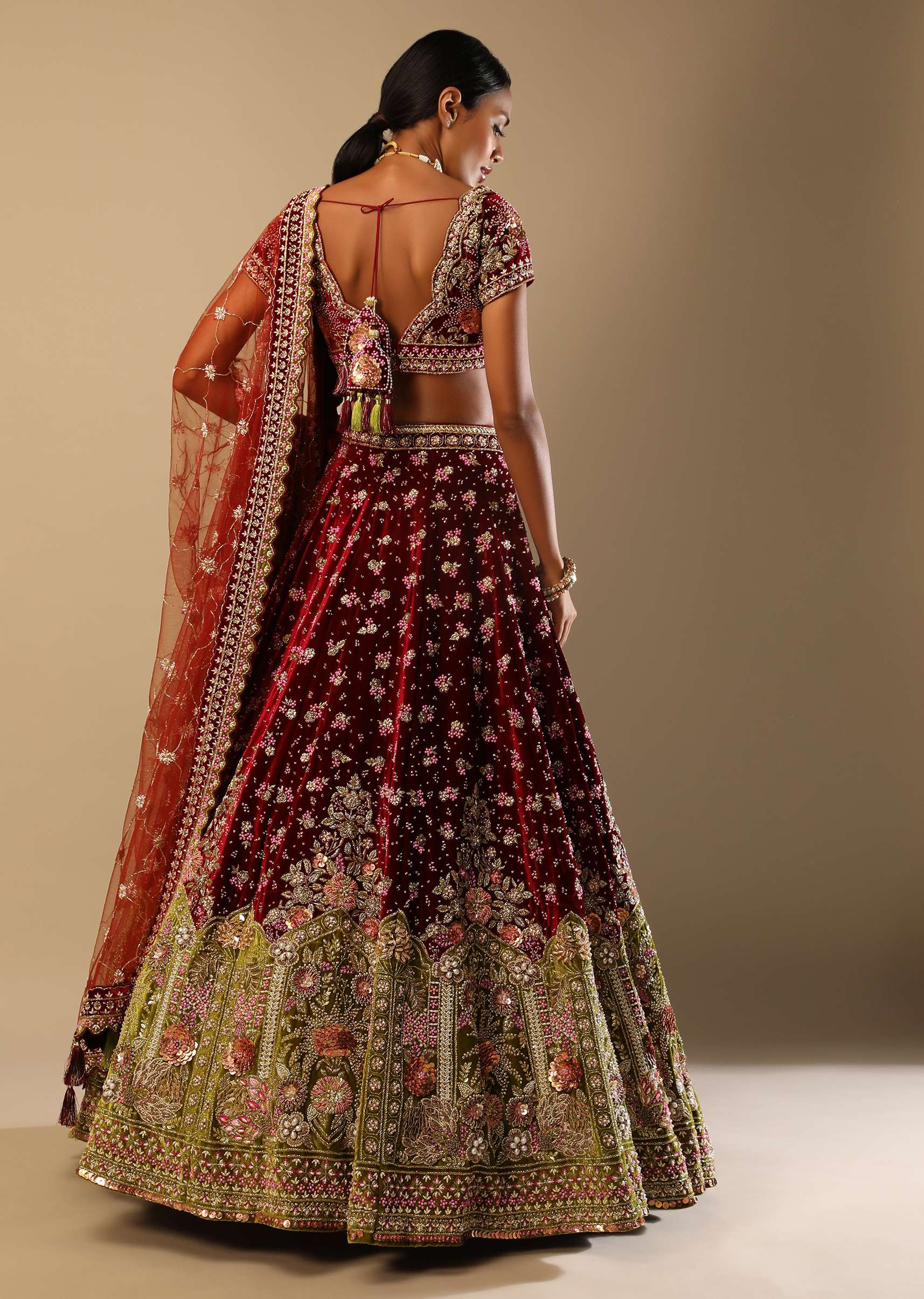 Persian Red Lehenga Choli In Velvet With Moss Green Mughal Border And Multi Colored Hand Embroidered Flowers