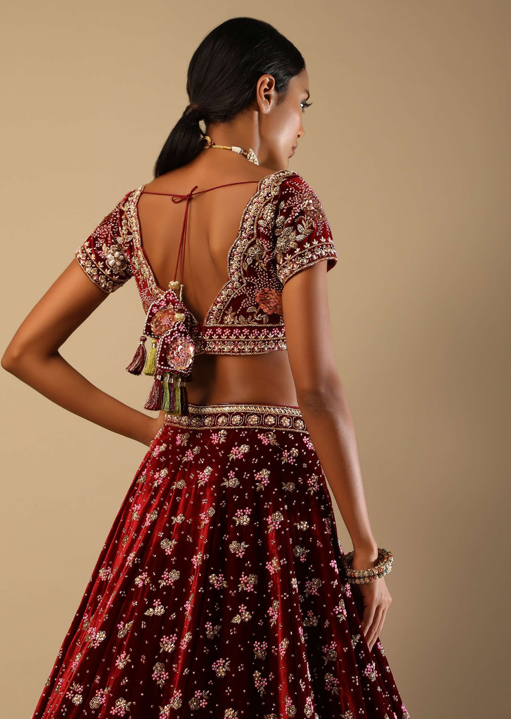 Persian Red Lehenga Choli In Velvet With Moss Green Mughal Border And Multi Colored Hand Embroidered Flowers